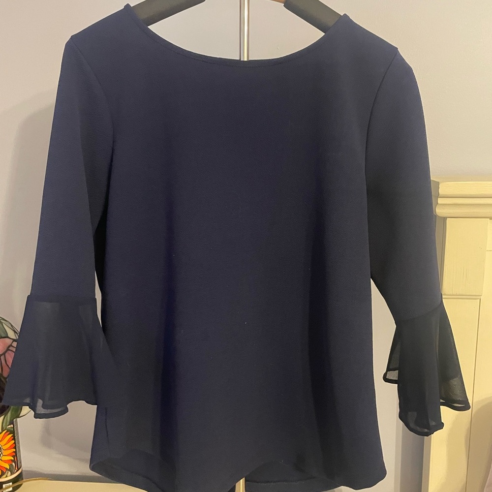 Elegant, navy blue blouse with sheer bell sleeves
